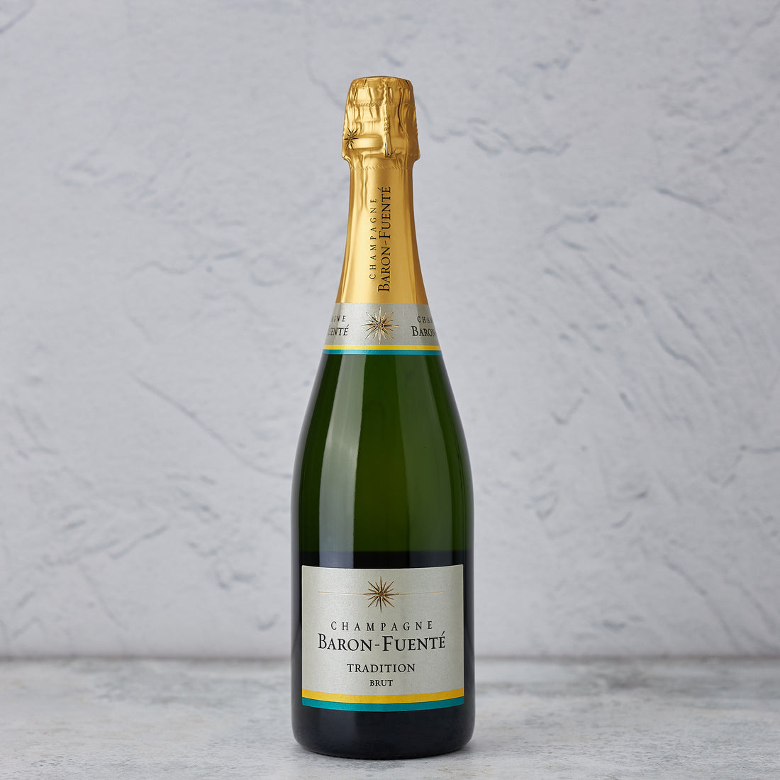 A bottle of NV Champagne Baron Fuente Brut Tradition 750ml Sparkling Wine