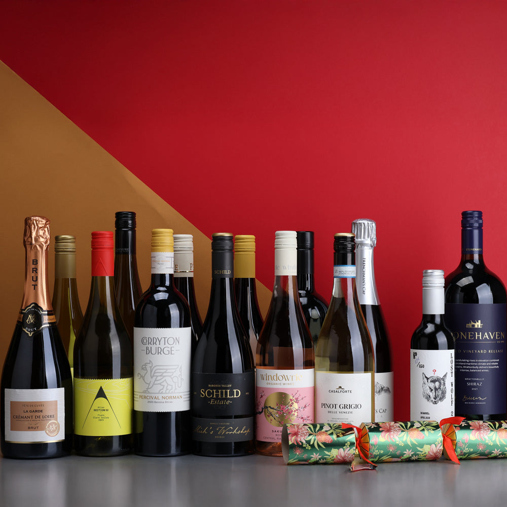 A collection of The Perfect Christmas Dozen + 2 Bonus Gift Bottles from The Wine Collective