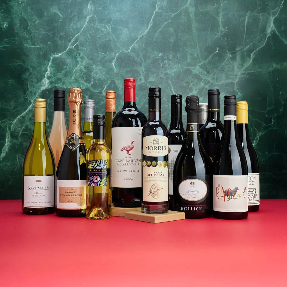 A collection of The Perfect Christmas Dozen + 2 Bonus Gift Bottles from The Wine Collective