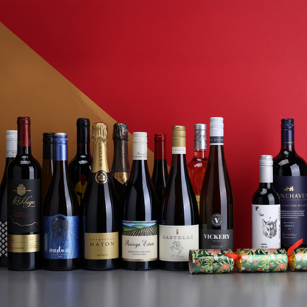 A collection of The Ultimate Christmas Day Luxury Dozen feat. Bonus 1500ml Magnum & Fortified from The Wine Collective