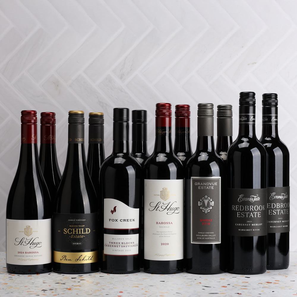A collection of Red and Gold - Awarded Red Wine Dozen from The Wine Collective