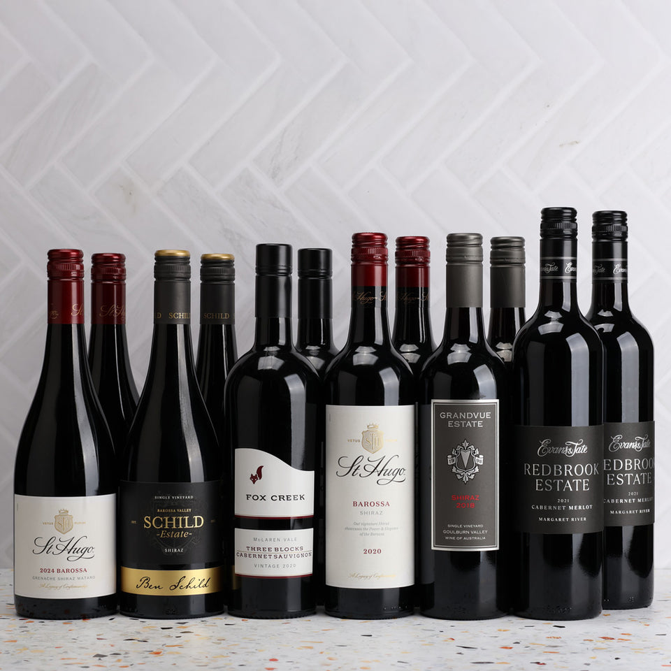 A collection of Red and Gold - Awarded Red Wine Dozen from The Wine Collective
