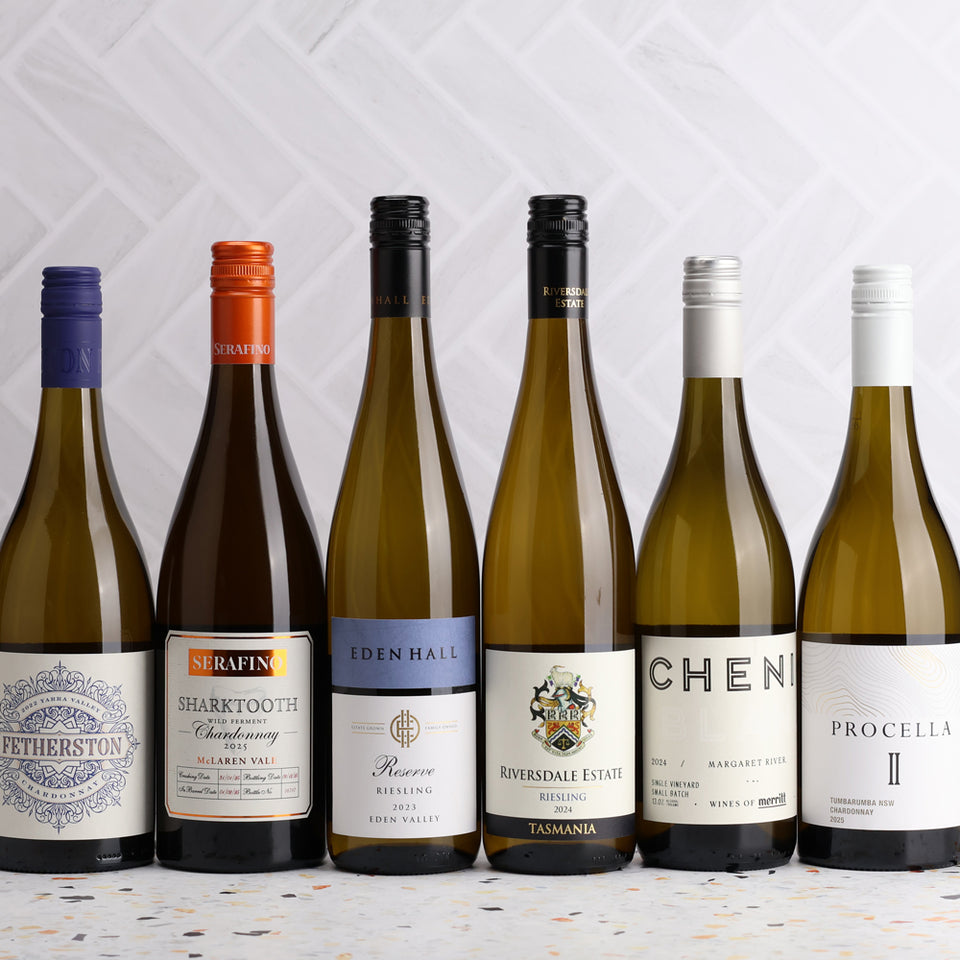 A collection of Mystery Revealed White 6pack from The Wine Collective