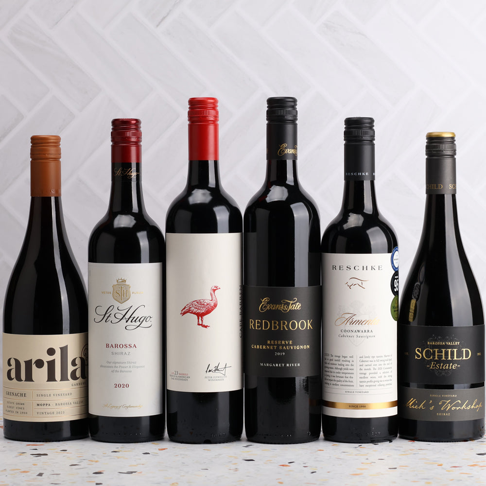 A collection of Mystery Revealed Red 6pack from The Wine Collective